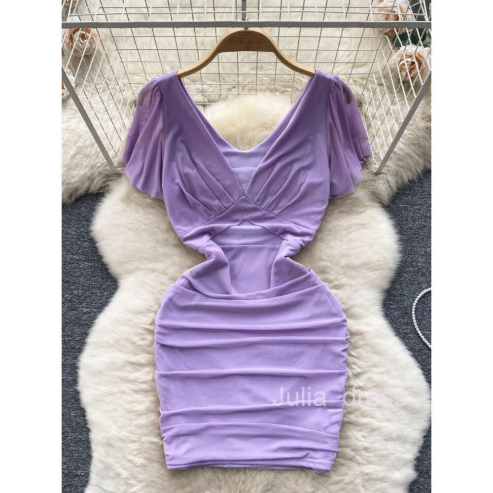 Nightclub womens clothing design sense dress female mind machine perspective hollowed out pleated slim fit short sexy buttocks wrapped skirt trend