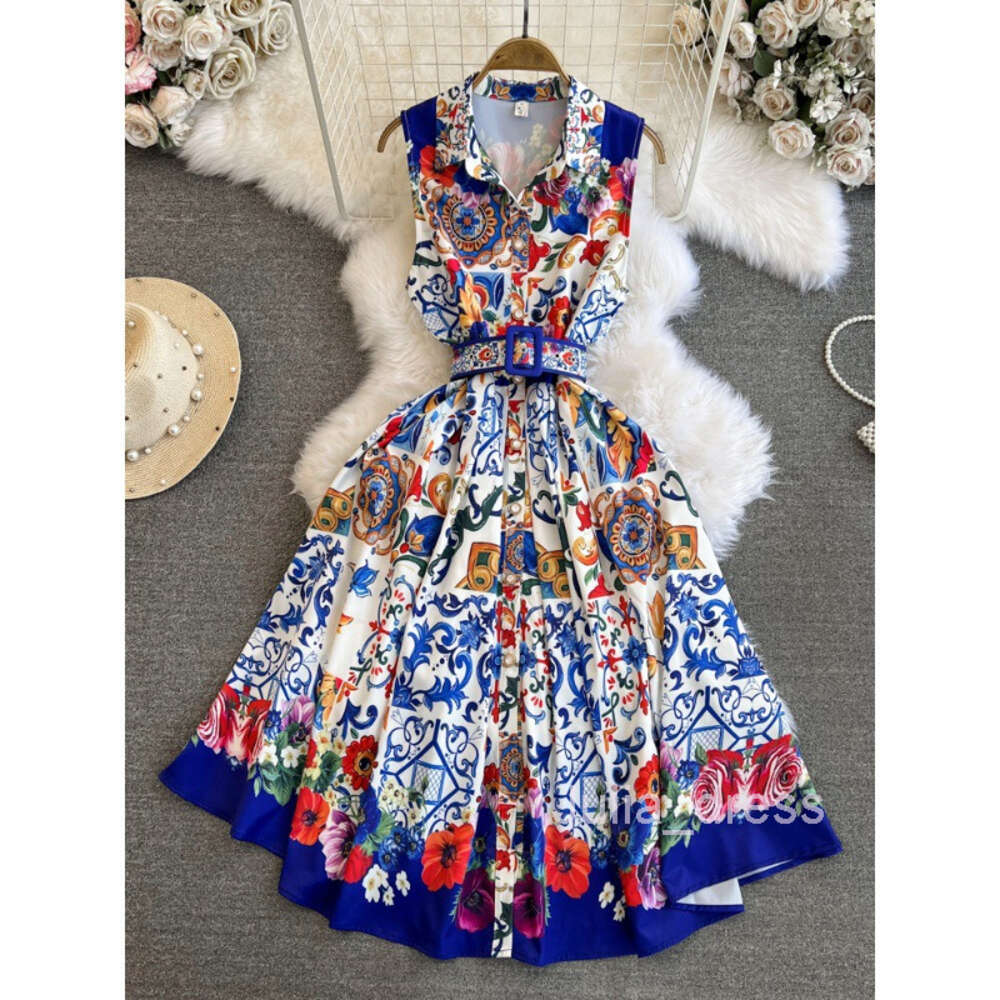 High end light luxury socialite temperament sleeveless V-neck waistband slimming effect mid length version A-line positioning printed dress dress