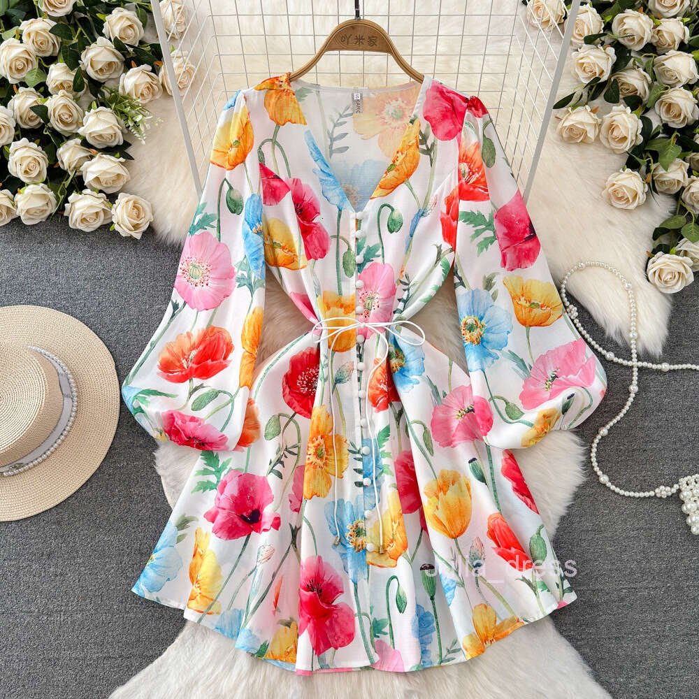 Spring and autumn design sense socialite temperament lantern long sleeved V-neck waistband slimming effect single breasted A-line printed dress for wo