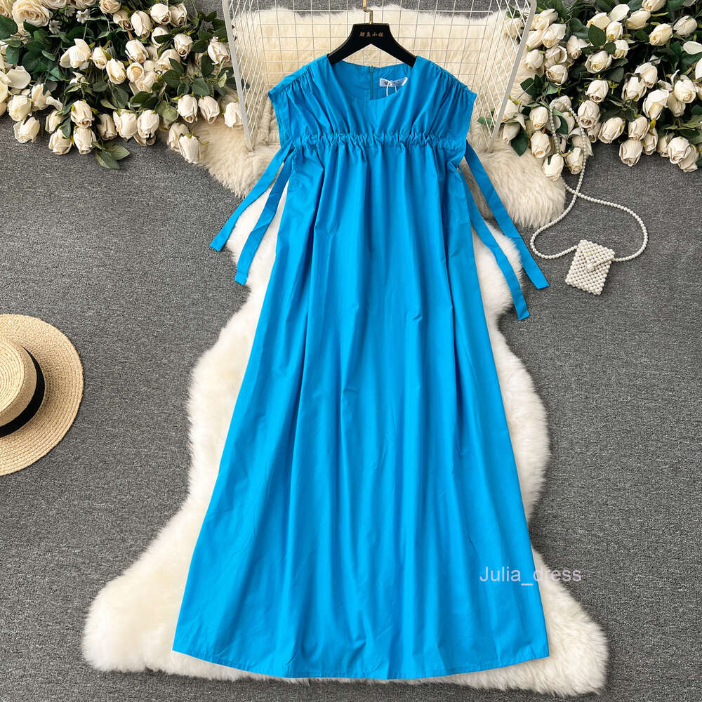 French dress for women with a high-end feel revealing a white blue loose fit and slimming effect. Mid length lazy style vacation dress tank top skirt