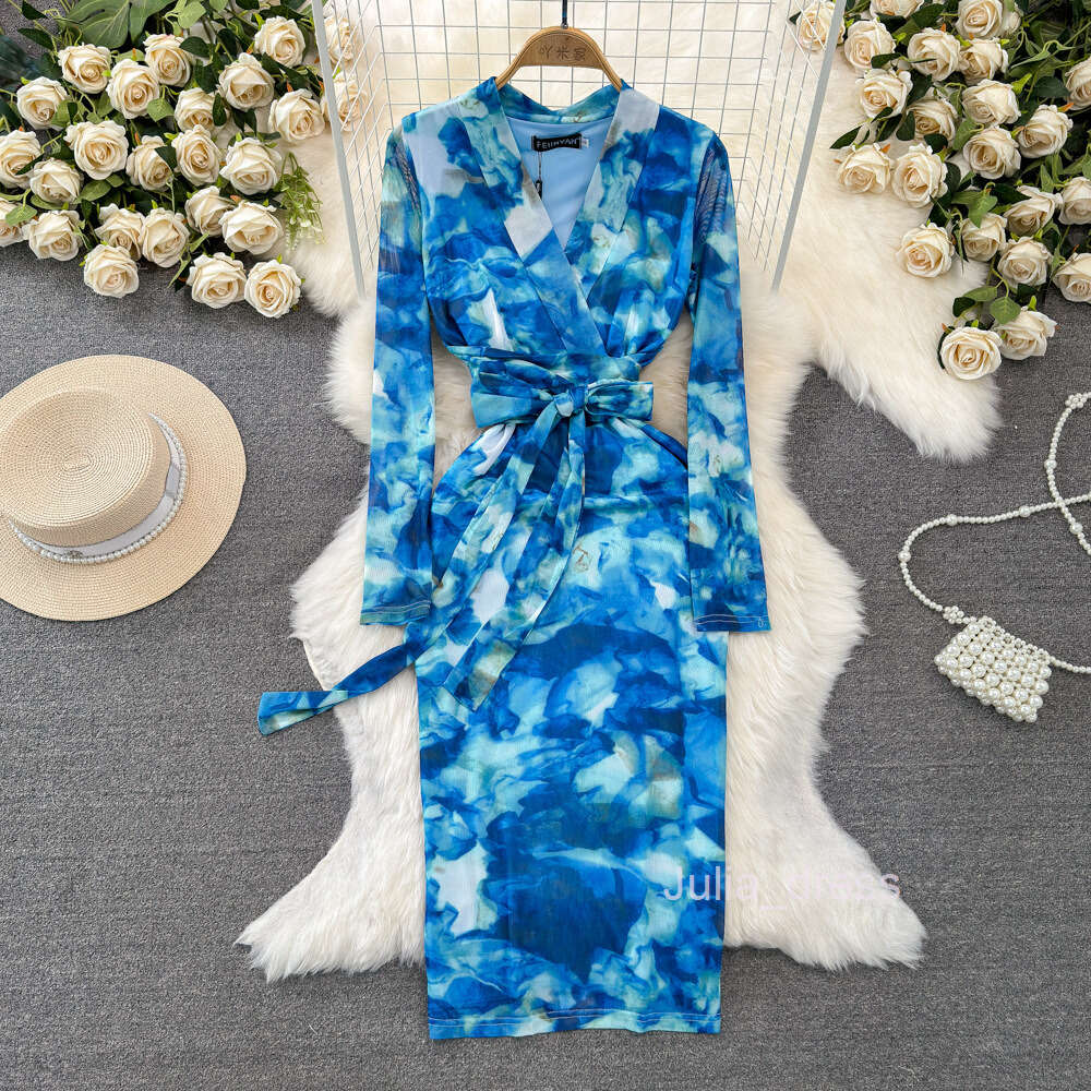 Feminine and socialite temperament long sleeved V-neck with waistband and slimming effect medium length halo dyed printed buttocks wrapped bottom dres