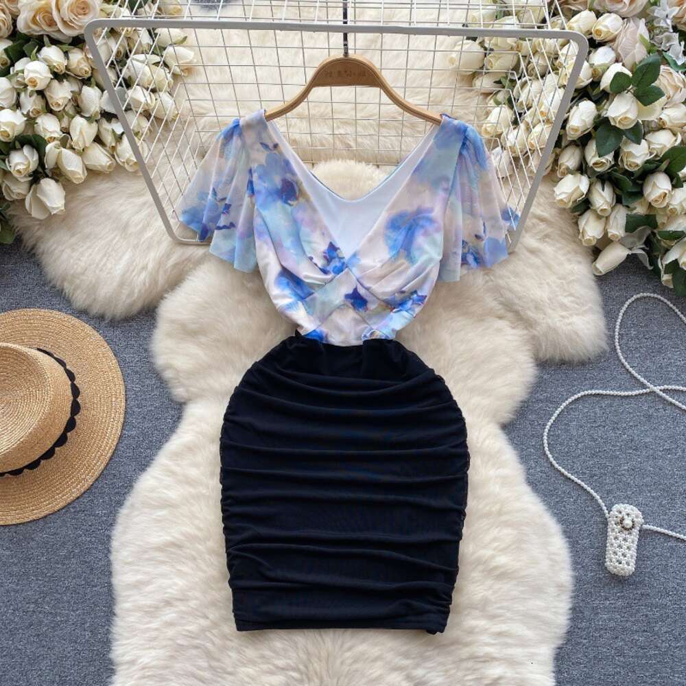 Nightclub womens sexy deep V-neck niche color blocking splicing waist tightening slimming sexy buttocks wrapped skirt small stature dress