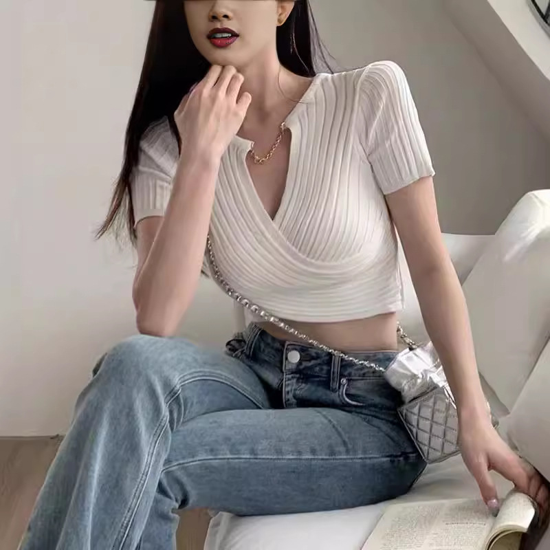 New V-neck cross white knitted sweater for women, spring new design, spicy girl short sleeved unique and chic designer top