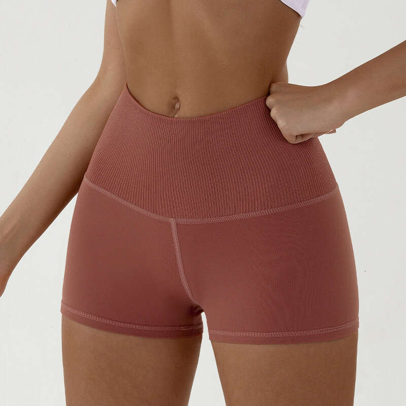 Yoga shorts for women in spring summer, high waisted hip lifting clothing, tight fitting running, outdoor sports and fiess shorts, three quarter pants