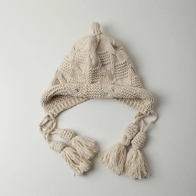 Winter Ear Protection Hat Women Fashion Tassels Handmade Knitted Cute Red Black Color Wool Beanie Outdoor Skull Cap 241125