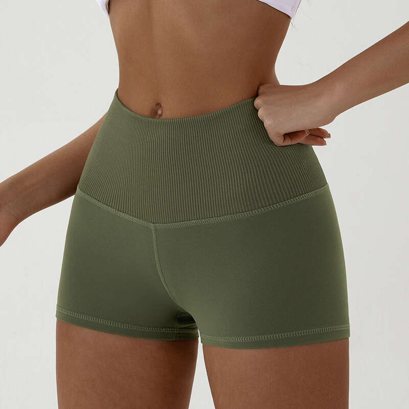 Yoga shorts for women in spring summer, high waisted hip lifting clothing, tight fitting running, outdoor sports and fiess shorts, three quarter pants