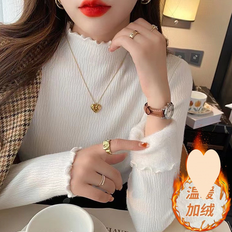 The new winter collection adds a thick one-piece velvet sweater for women, featuring a semi high collar and wooden ear lining with a stylish designer 