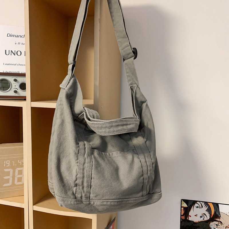 Large capacity canvas bag for women, Korean version, artistic style, simple and lazy style, versatile shoulder bag, student class bag, crossbody bag 2