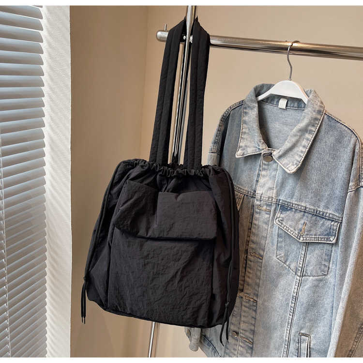 Fashionable new large capacity tote bag for women in autumn and winter, solid color nylon and cotton shoulder bag, sweet commuting multi-purpose shoul