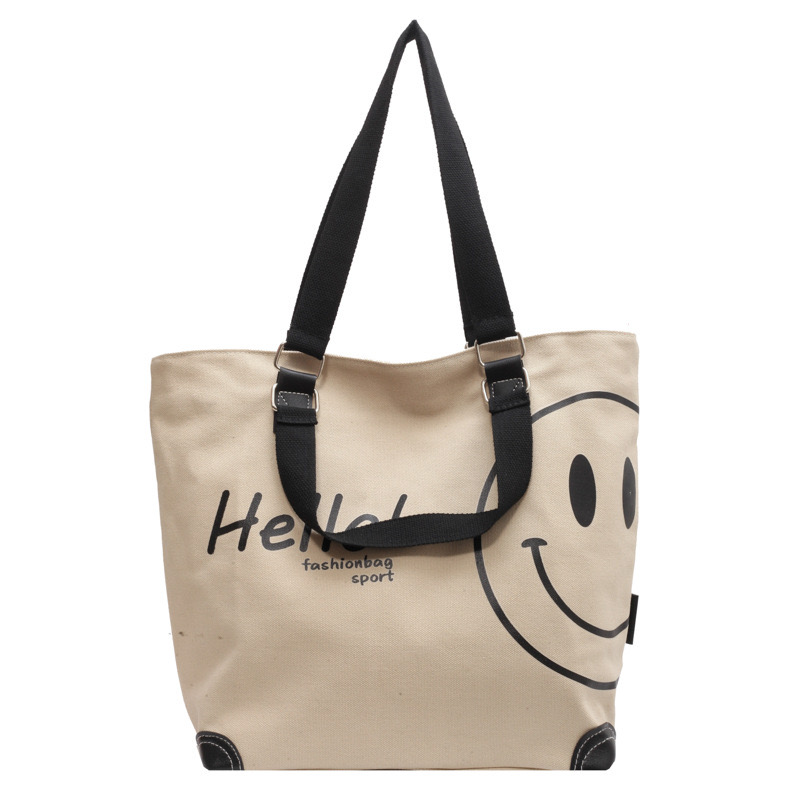 2024 new large capacity fashionable simple shoulder canvas bag Korean version New casual student smig face handbag for women