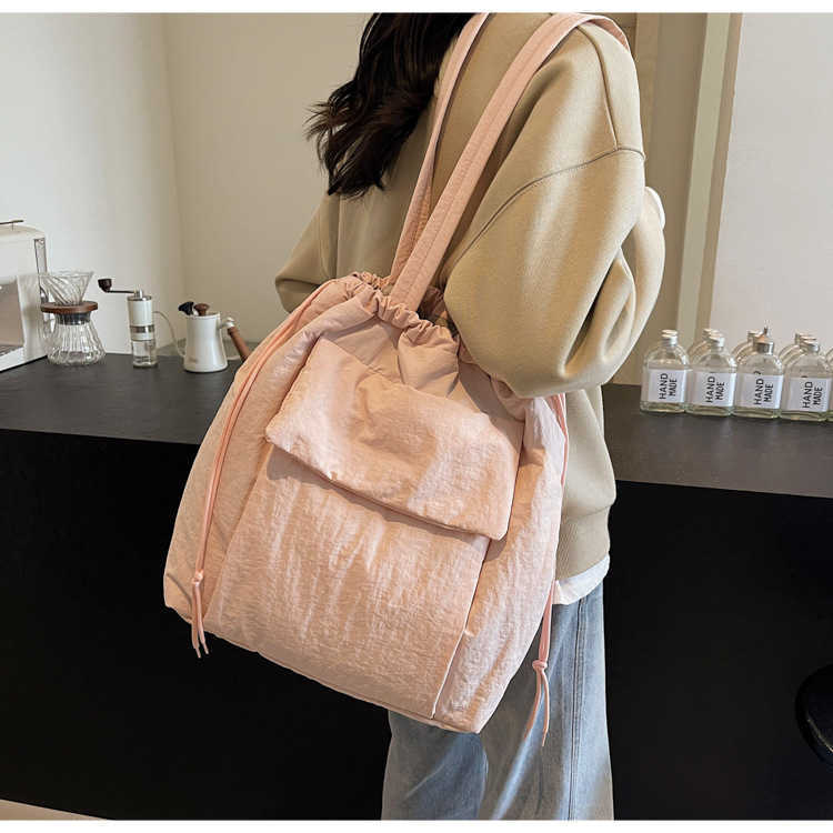 Fashionable new large capacity tote bag for women in autumn and winter, solid color nylon and cotton shoulder bag, sweet commuting multi-purpose shoul