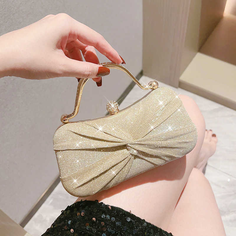 High end temperament cross pleated handbag, socialite banquet bag, hand-held evening gown bag, KTV dress bag, sparkling small bag