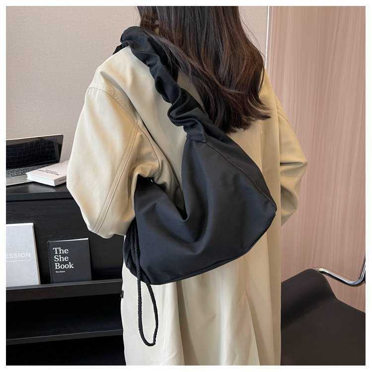 Canvas bag women's Korean version single shoulder pleated drawstring canvas bag small fresh artistic hand-held diagonal cross casual women's