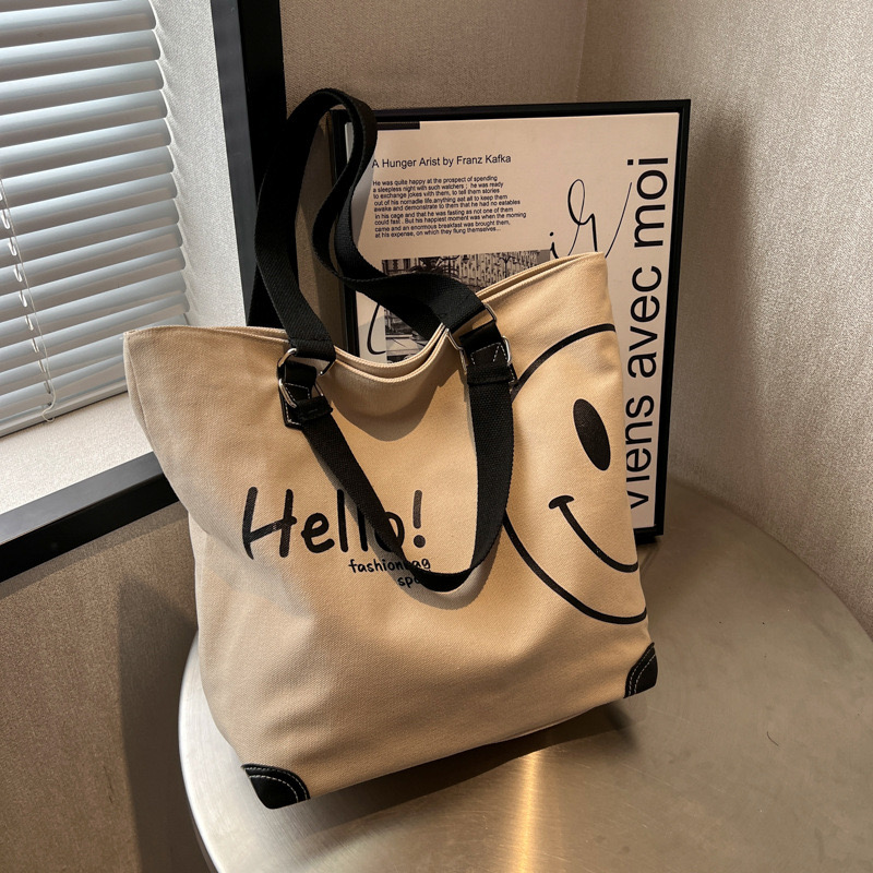 2024 new large capacity fashionable simple shoulder canvas bag Korean version New casual student smig face handbag for women
