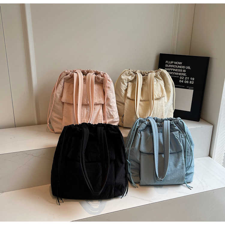 Fashionable new large capacity tote bag for women in autumn and winter, solid color nylon and cotton shoulder bag, sweet commuting multi-purpose shoul