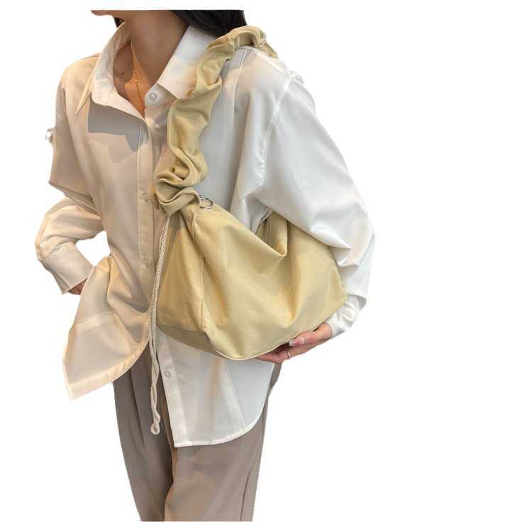 Canvas bag women's Korean version single shoulder pleated drawstring canvas bag small fresh artistic hand-held diagonal cross casual women's