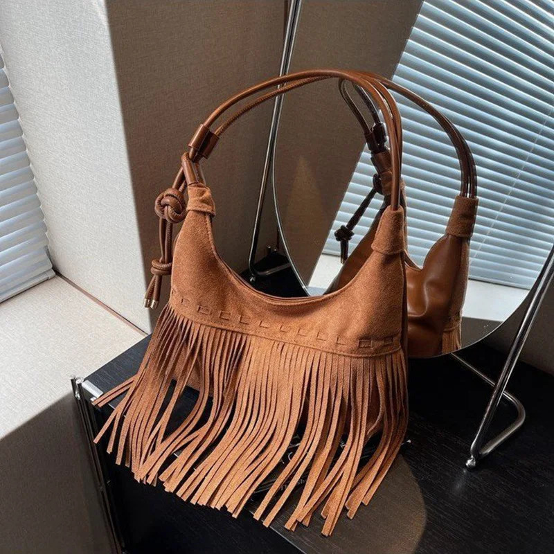 New Free Shipping Designer Bag 2025 Retro Suede Tassel Fashion Trend Half Moon Handbag Shoulder Cross Body Money Bag