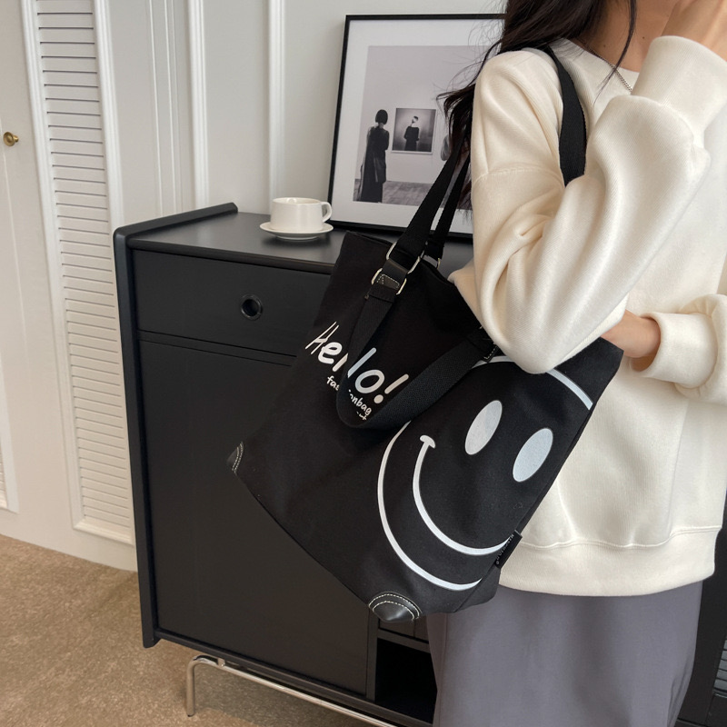 2024 new large capacity fashionable simple shoulder canvas bag Korean version New casual student smig face handbag for women