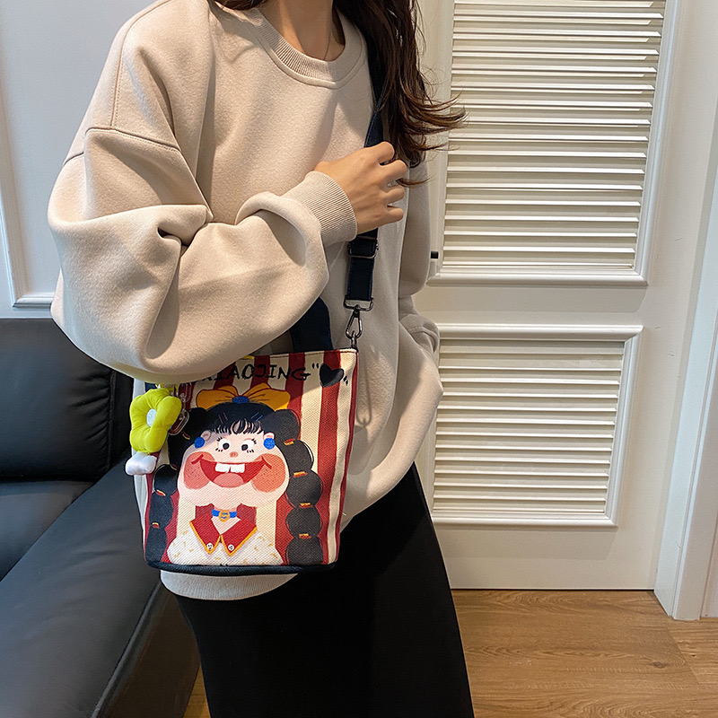 Small niche design New illustration for women 2024 new trendy print personality funny shoulder cute bucket crossbody bag