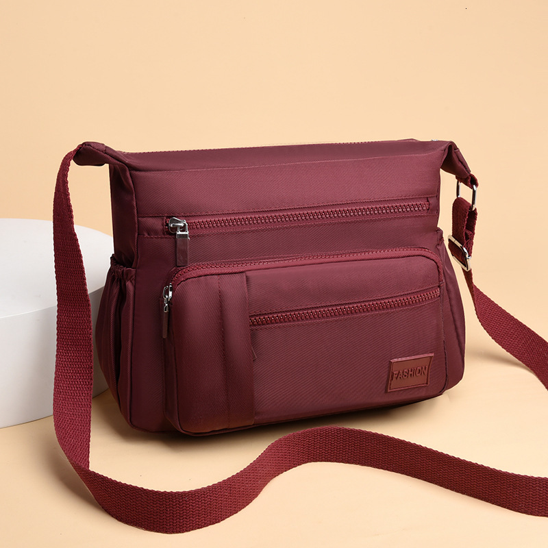 2025S designer casual nylon fabric versatile crossbody fashionable commuting new simple lightweight large capacity women shoulder bag