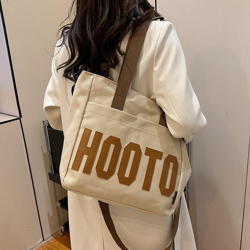 2025 new Letter canvas female students, large capacity crossbody going out, tote for commuting to work, handbag, shoulder bag zhanyishengli