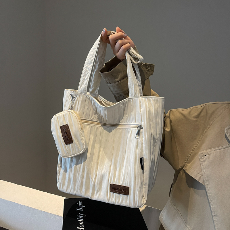 2025 new new Korean version large capacity tote women's niche design pleated solid color casual single shoulder armpit bag zhanyishengli