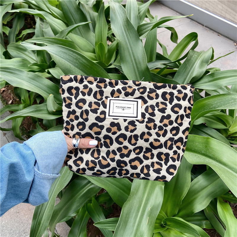 2025 new Korean Fashion Leopard Patterned Masked Makeup Women's Handheld Canvas Convenient Wash Storage Bag zhanyishengli