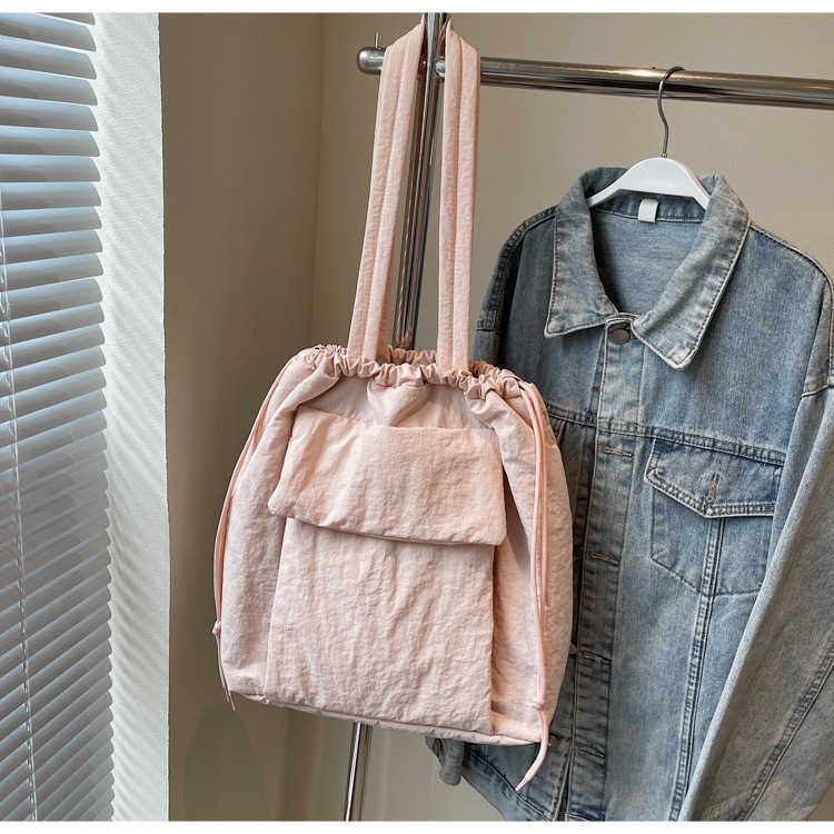 Fashionable new large capacity tote bag for women in autumn and winter, solid color nylon and cotton shoulder bag, sweet commuting multi-purpose shoul