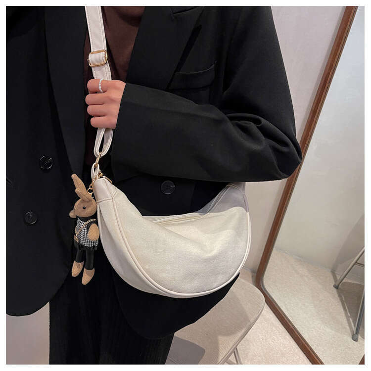 New women's frosted coarse diagonal flip bucket bag, student class shoulder premium crossbody bag