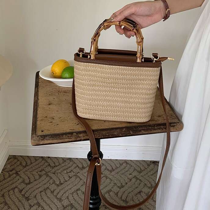2024 summer new niche crossbody small women, high-end texture hand-held grass woven bucket bag for women