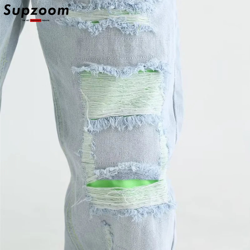 Supzoom has arrived at the top of fashion in autumn washing light white personalized eyelets patch fabric casual denim heart empty jeans 241203