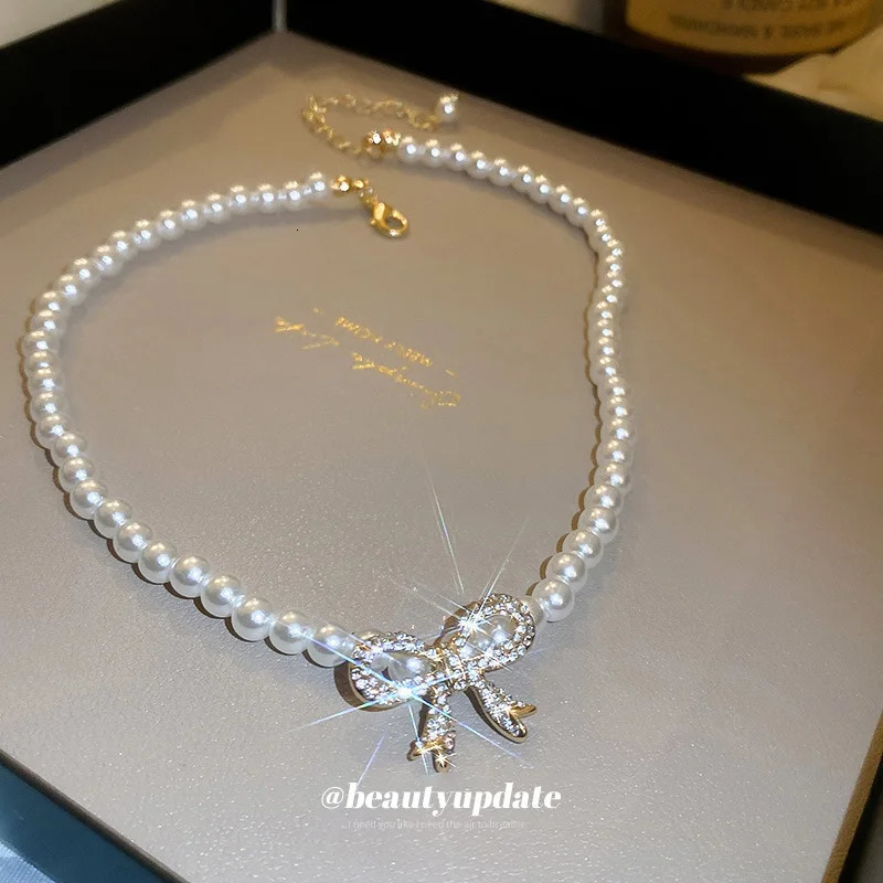 Fashionable pearl bow necklace paired with zircon French retro style jewelry gift for wife 241205