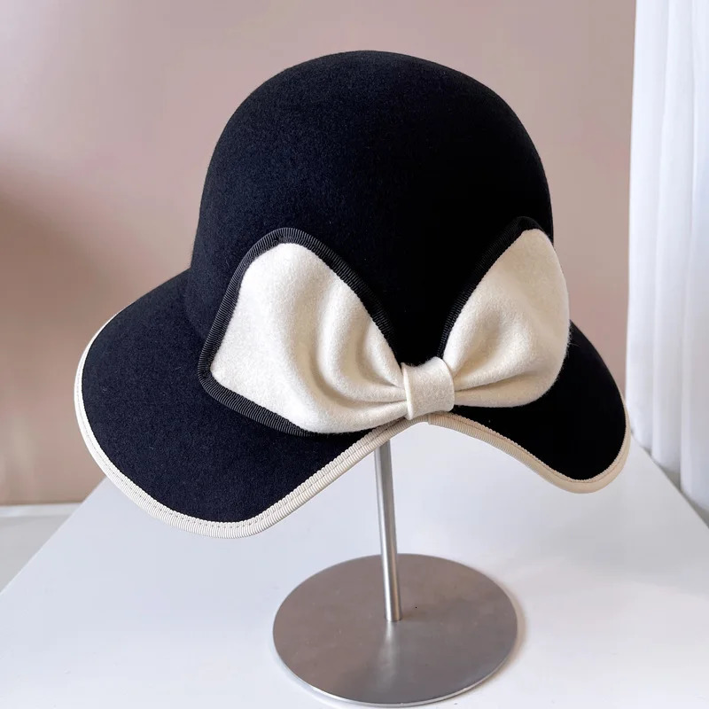 Haiben flutters in the wind behind a bow and tailcoat top hat autumn and winter fisherman hat Australian wool hat fashionable table tennis hat 241205