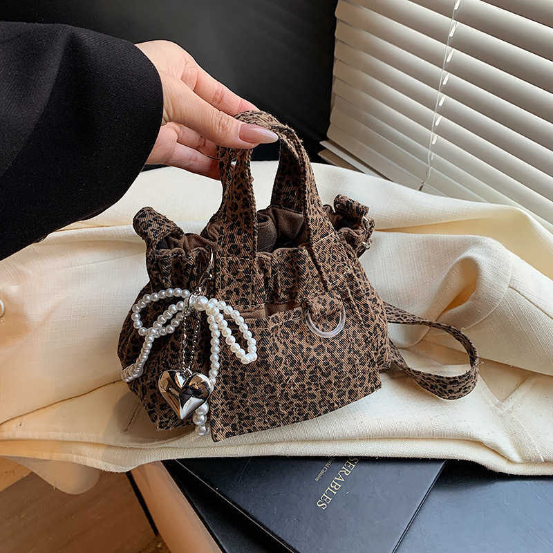2025 Spring New Canvas Leopard Pattern Small Bag, Single Shoulder Crossbody Bag, Handheld Sail Bag, Niche Mini 241205