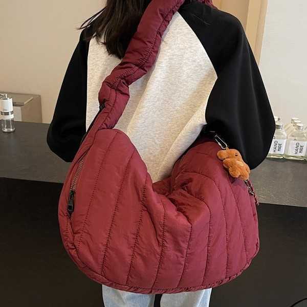 women Korean version niche trend drawstring nylon cloth bag, casual sports dumpling bag, single shoulder crossbody bag 241215