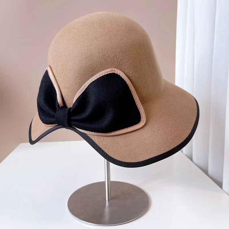 Haiben flutters in the wind behind a bow and tailcoat top hat autumn and winter fisherman hat Australian wool hat fashionable table tennis hat 241205