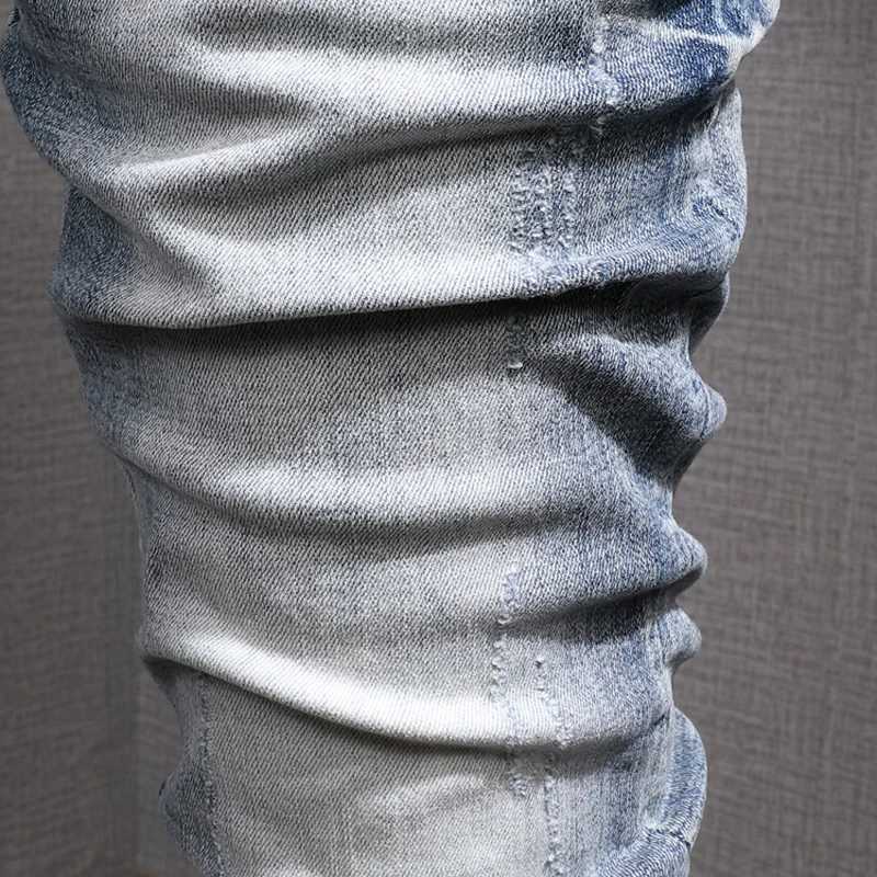 Fashion designer mens jeans retro light blue elastic slim print cracked jeans mens hole Trouser retro casual pants Hombre W241205