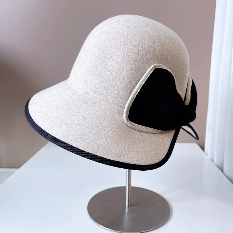 Haiben flutters in the wind behind a bow and tailcoat top hat autumn and winter fisherman hat Australian wool hat fashionable table tennis hat 241205