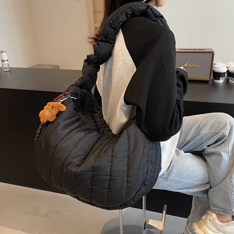 women Korean version niche trend drawstring nylon cloth bag, casual sports dumpling bag, single shoulder crossbody bag 241215