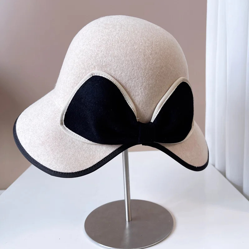 Haiben flutters in the wind behind a bow and tailcoat top hat autumn and winter fisherman hat Australian wool hat fashionable table tennis hat 241205