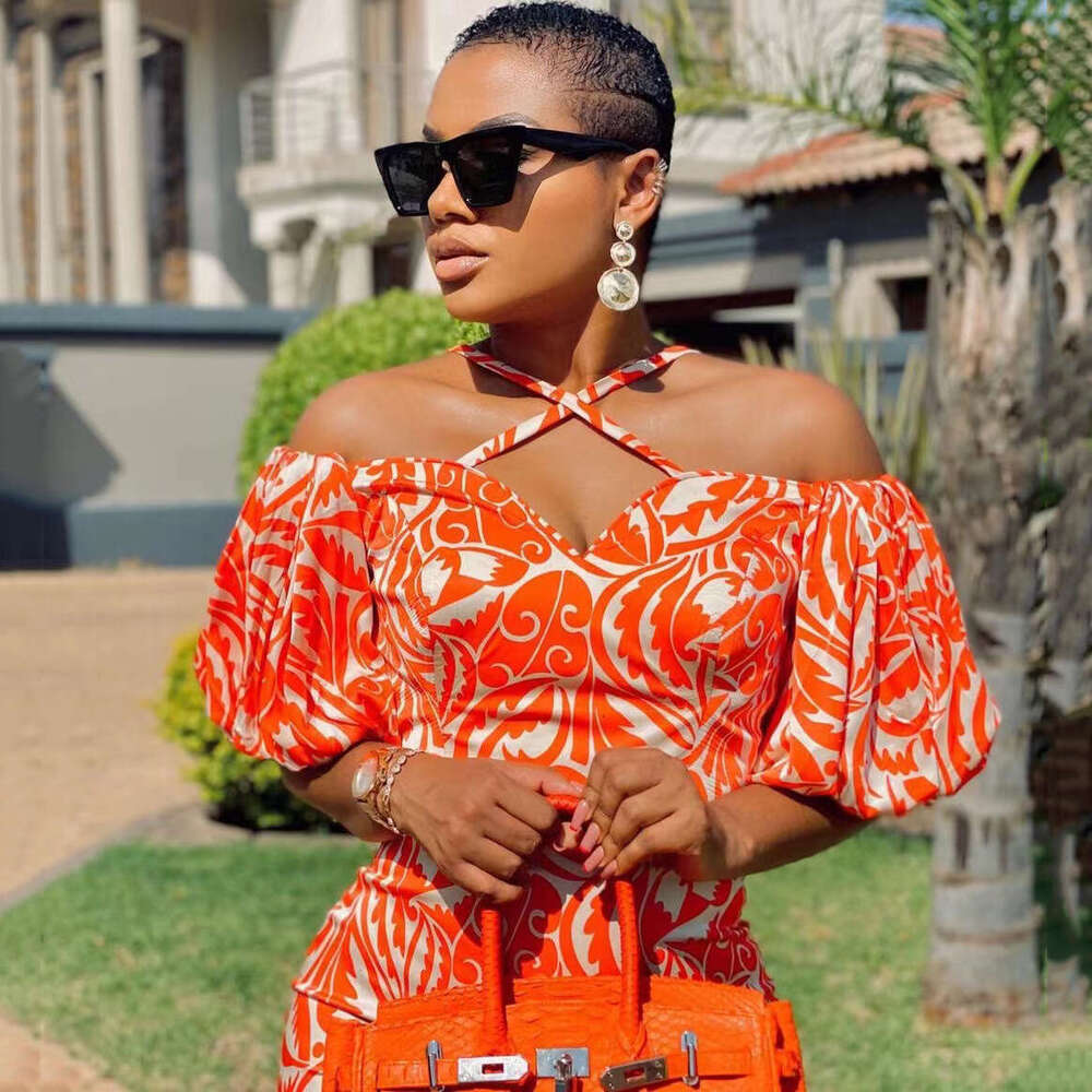 spring/summer European and American women's dress with printed slit, strapless, hanging neck, V-neck long skirt, 2024 versatile temperament, new 