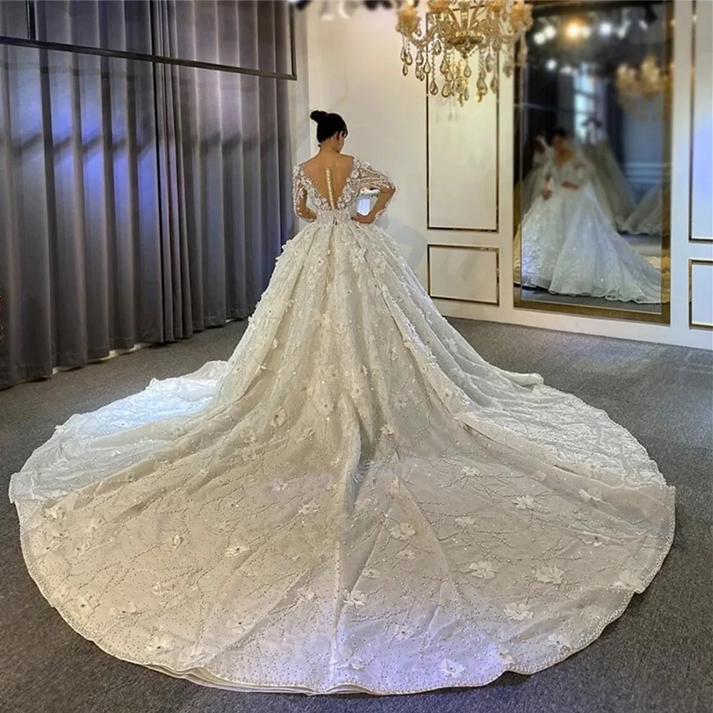 Luxury Floral Beads Wedding Dresses Illusion Lace Sequins Bridal Gowns Long Sleeves Crystals Pearls Brides Dress Robes 3D Floral Brides Gowns Vestido 