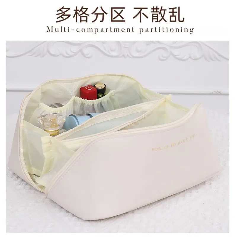 Cosmetic ins large capacity pillow storage PU leather portable cosmetic travel business travel portable toilet bagXJ241206