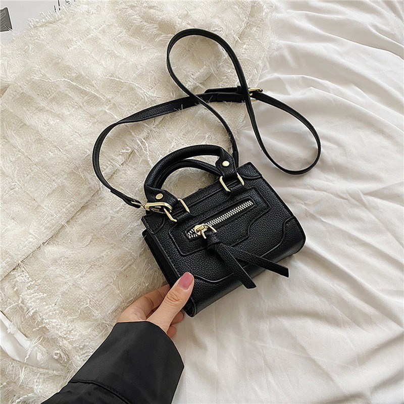 New Mini Handbag for Women with Lychee trend Pattern Candy Color Coins Lipstick Wallet and leisure Handbag Designer Bag Motorcycle Bag
