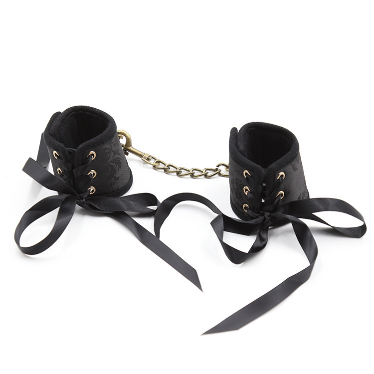 Manufacturer wholesale SM sex toys, black satin ribbon, wealthy gold handcuffs, bound women's sex toys handcuffs