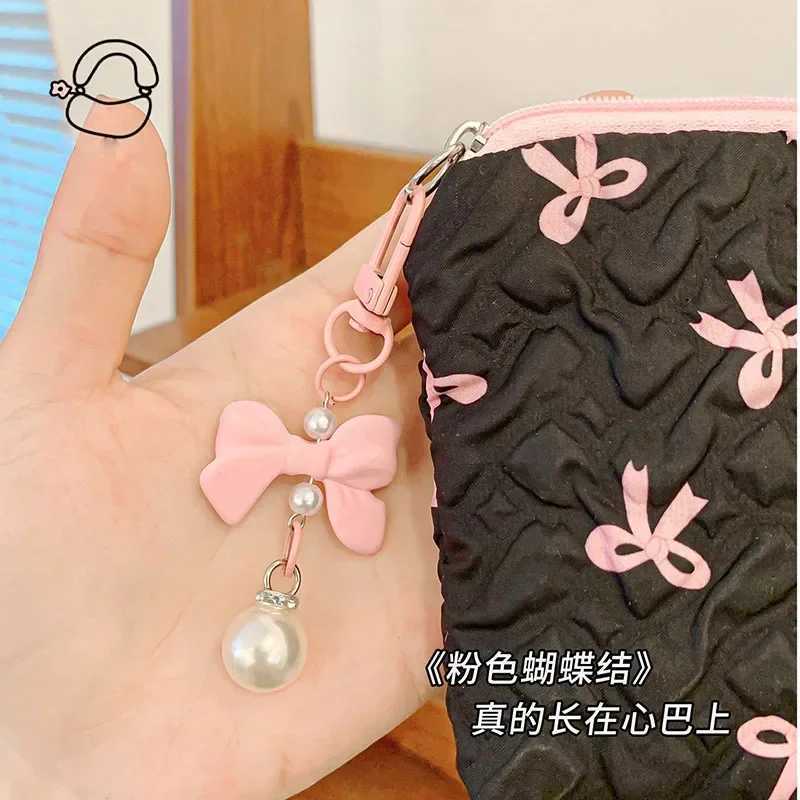 Small Hand Makeup Bag Pink Black Print Bow Womens Cvenient Lipstick Card Mini Case Cosmetic Bag Sanitary napkin Storage BagXJ241206