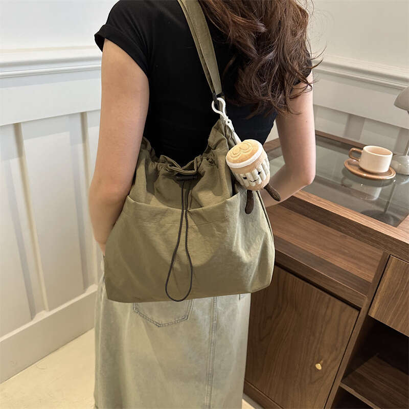 New Large Capacity Waterproof Nylon Fabric Drawstring Pleated Shoulder Bag For Travel And Leisure, Crossbody Bucket Bag, Fashionable Quality, Classic 