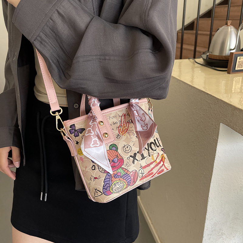 2024 Autumn New Handbag Women's Cartoon Bear Graffiti Bucket Texture Fashion Single Shoulder Crossbody Bag