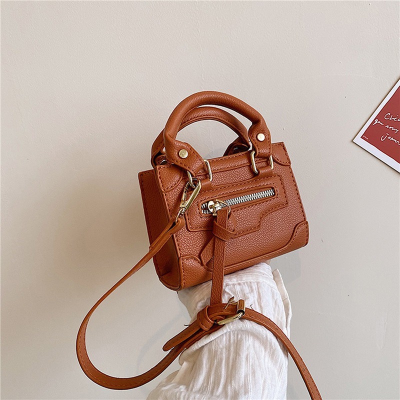 New Mini Handbag for Women with Lychee trend Pattern Candy Color Coins Lipstick Wallet and leisure Handbag Designer Bag Motorcycle Bag