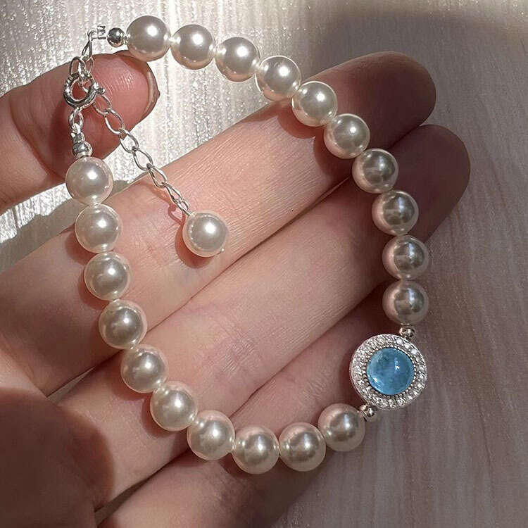 S925 pure silver natural sea blue treasure strong light pearl bracelet for women's niche, light luxury, exquisite high-end feeling bracelet